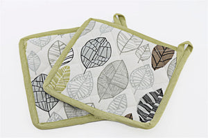 Two Fabric Pot or Pan Mats With Contemporary Green Leaf Print Design